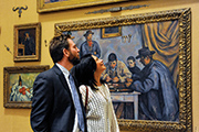 A couple looking at paintings